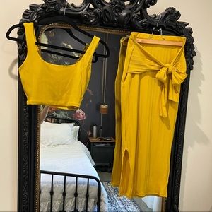 Two piece, mustard, midi skirt with tie and crop top.